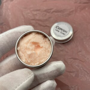 Modeling paste, craft supplies, customizing tools, and a UV lamp for doll face making. Modeling paste is often used to sculpt facial features, while customizing tools can be used to add details like lips or eyeshadow.
