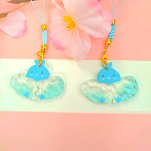 Charms acrílicos ondulados de Altaria