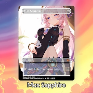May include: A Mox Sapphire card with an anime-style illustration of a character in a black outfit and pink hair. The card includes the text "Mox Sapphire" at the top and bottom, with "Artifact" and game instructions. The background is a colourful gradient.