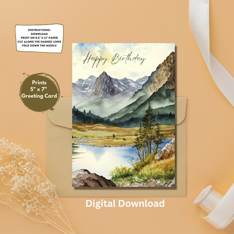 Puede incluir: Tarjeta de felicitaci&oacute;n imprimible de 13x18 cm con una ilustraci&oacute;n de acuarela de un paisaje de monta&ntilde;a con un lago y &aacute;rboles. El texto "Happy Birthday" est&aacute; escrito en la parte superior de la tarjeta.