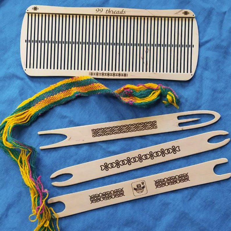 May include: A wooden loom with 99 threads, a woven tapestry in green, yellow, and pink, and three wooden weaving needles with intricate designs.