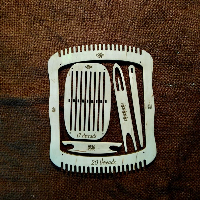 May include: Wooden loom with two weaving frames, one for 17 threads and one for 20 threads. The loom also includes two weaving needles and a shuttle.