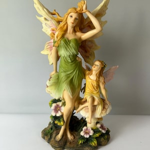 Figura alta vintage de hada madre e hijo de Pacific Trading Company