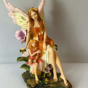 Figura alta vintage de hada madre e hijo de Pacific Trading Company