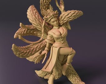 May include: A detailed figurine of a woman with multiple fox tails, wearing a flowing robe and a crown. The figurine is made of a light brown material and has a detailed, intricate design.