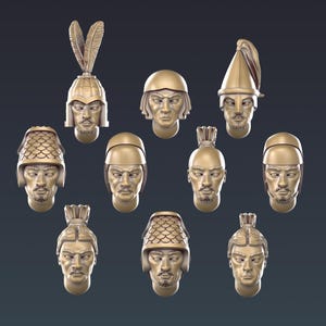Op de afbeelding: Een verzameling van tien goudkleurige bustes, elk met een mannelijke figuur met verschillende hoofddeksels. De helmen en kapsels variëren, waaronder helmen met veren, conische hoeden en schubbenpantser, allemaal met gedetailleerde gelaatstrekken.
