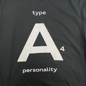 May include: Black t-shirt with a white graphic that says "type A 4 personality".