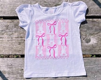 Camisa infantil rosa com laço para a Páscoa