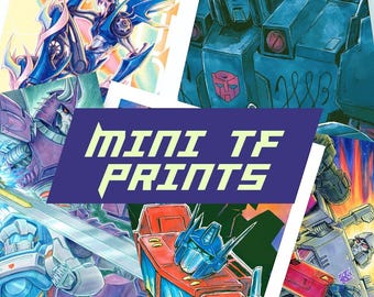May include: A collection of colorful robot character illustrations featuring various mechanical figures in action poses, with a central purple banner displaying the text MINI TF PRINTS in a bold, angular, light yellow font against the artwork.