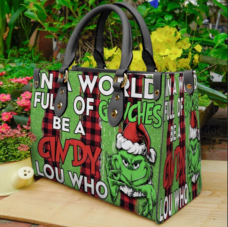 Discover In a World Full Of GrinchesS Leather Bag,funny character Women Bags