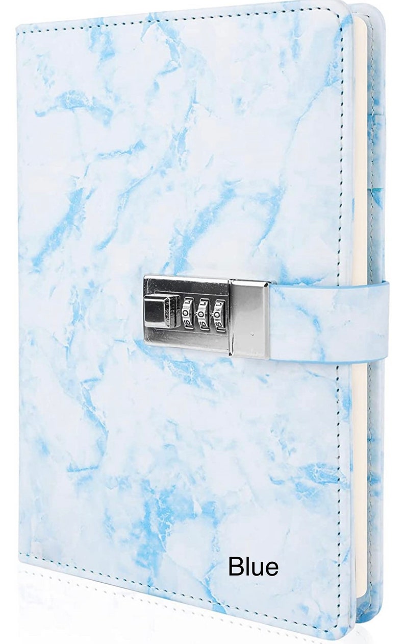 May include: A blue marble-patterned journal with a combination lock. The lock has three dials and is silver in color. The journal has a flap that closes over the lock.