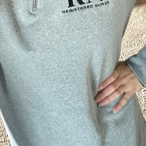 Personalized nurse embroidered quarter zip with sleeve embroidery