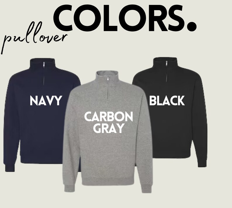 May include: Three pullover sweatshirts in navy, carbon grey, and black. The sweatshirts have a mock neck and a zipper at the neck. The text "NAVY", "CARBON GREY", and "BLACK" is printed in white on the front of each sweatshirt.