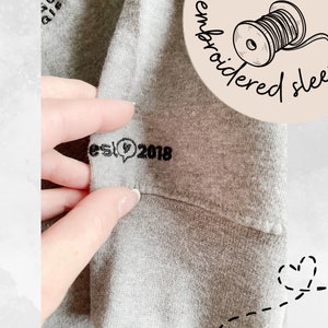 Personalized SLP embroidered quarter zip with sleeve embroidery for SLP