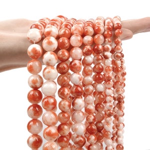 赤と白のペルシャ翡翠ビーズ：滑らかな丸い天然石ストランド