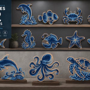 Pode incluir: Uma coleção de 12 designs de animais marinhos em azul e bege, incluindo um golfinho, um peixe e um caranguejo. Os designs são exibidos em prateleiras e incluem o texto "OCEAN ANIMALS BUNDLES 12 DESIGNS".