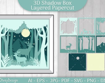 Puede incluir: Un diseño de papel cortado en 3D en forma de caja de sombra que representa una escena de bosque iluminado por la luna con dos ciervos, árboles y montañas. El diseño está en capas y viene en varias piezas para ensamblar. La imagen incluye el texto "3D Shadow Box Layered Papercut" y "By: OtveyDesign".