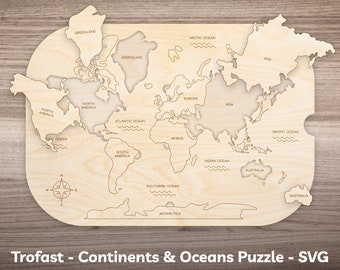 May include: A wooden world map puzzle with continents and oceans cut out. The puzzle is designed for use with the Trofast system.