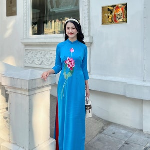 Blue Vietnamese traditional Ao Dai long dress with 3D flower lotus , including pants