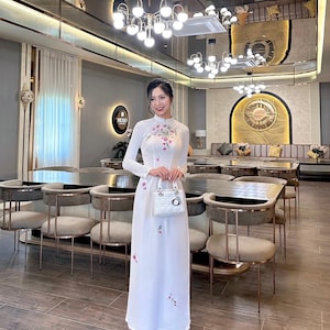 White Vietnamese traditional Ao Dai long dress with 3D flower , including pants
