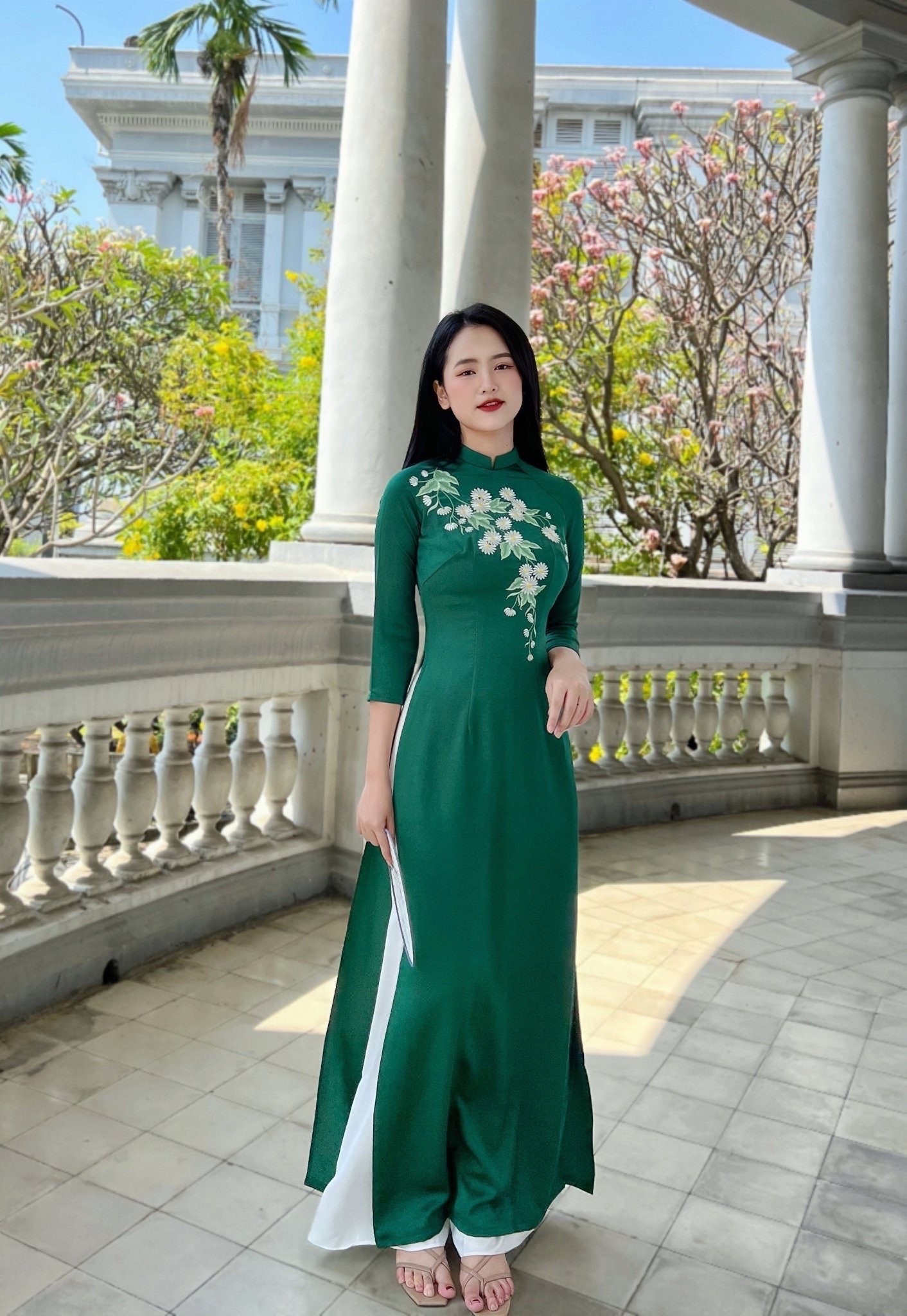 Green Vietnamese traditional Ao Dai long dress with 3D flower including pants