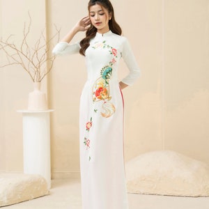 White Vietnamese traditional Ao Dai long dress with 3D flower , including pants