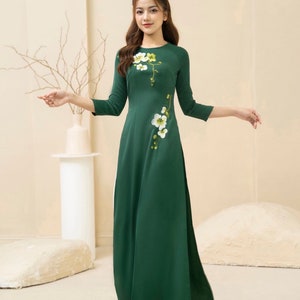 Green Vietnamese traditional Ao Dai long dress with 3D flower , including pants
