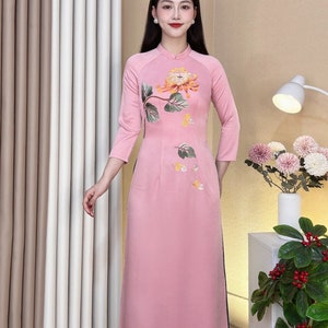 Pink Vietnamese traditional Ao Dai long dress with 3D flower , including pants