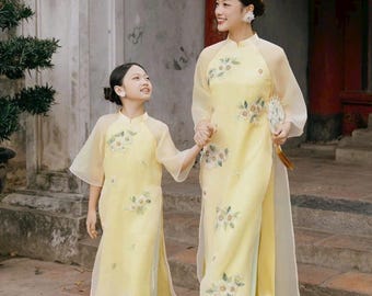 Truc Xuan Ao Dài Lụa Gấm| Yellow/light Peach Pre Made Ao Dai Truc Xuan Ao Dài Lụa Gấm| Yellow/light Peach Pre Made Ao Dai