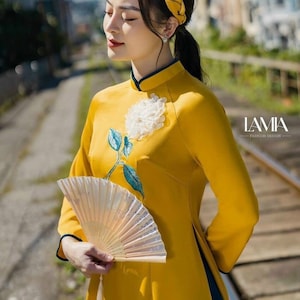 Yellow Vietnamese traditional Ao Dai long dress with 3D flower , including pants