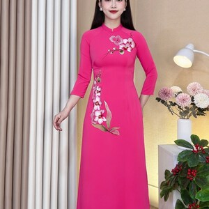 Pink Vietnamese traditional Ao Dai long dress with 3D flower , including pants
