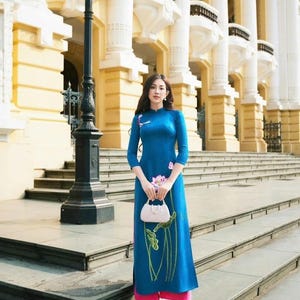 Blue Vietnamese traditional Ao Dai long dress with 3D flower , including pants