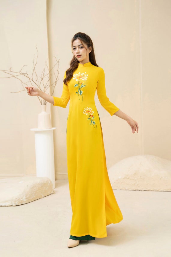 Yellow Vietnamese traditional Ao Dai long dress with 3D flower , including pants