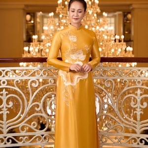 Yellow mustard Ao dai Vietnamese traditional dresses for women included pants