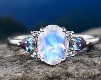 Anillo de compromiso de piedra lunar azul natural ovalada de 1,5 ct. Anillo de bodas vintage de alejandrita en forma de pera con cambio de color. Piedra natal de junio. Regalos de cumpleaños y promesas.