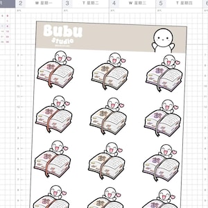May include: Sheet of planner stickers featuring a smiling cartoon character with a heart, sitting on top of an open book. The book has a ribbon bookmark and floral accents. The stickers are in various colors.