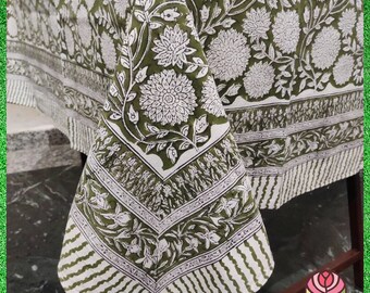 May include: Green and white cotton tablecloth with a floral pattern. The tablecloth has a border with a repeating pattern of stripes and leaves.