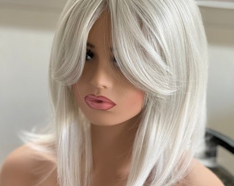 Witte Tillstyle-haartopper met vlinderpony