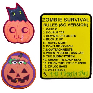 May include: Two Halloween-themed patches with a yellow background. The first patch features a pumpkin with a black cat peeking out of the top. The second patch features a yellow sign with the text "Zombie Survival Rules (SG Version)" and a list of rules in black text. The rules include: Cardio, Double Tap, Beware of Toilets, Buckle Up, Travel Light, Don't Be Kaypoh, No Attachments, When in Doubt, Ask Lah, The Buddy System, Check the Back Seat, Enjoy the Little Things, Ziploc Bags, Wet Tissue.