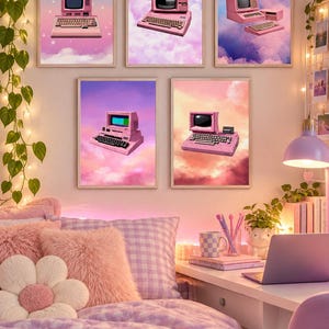 May include: Five rectangular wall art prints featuring pink vintage computer illustrations set against dreamy, colourful cloud and starry sky backgrounds. Each framed print displays a different retro desktop computer model floating amidst soft, pastel-toned clouds.