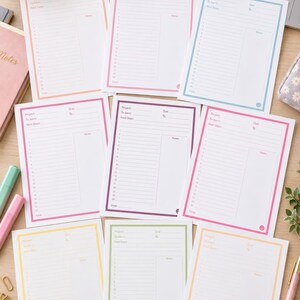 May include: A collection of eight rectangular project planning sheets with colored borders in orange, pink, blue, purple, magenta, yellow, green, and light orange. Each sheet features printed fields for Project, To Learn, Next Steps, Due, and Notes.