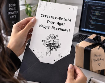 May include: A white rectangular birthday greeting card inside a black envelope. The card features black text that reads Ctrl+Alt+Delete Your Age! Happy Birthday! and a black and white sketch of computer keys labeled Ctrl, Alt, and Delete.