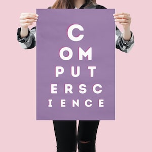Puede incluir: Una persona sosteniendo un cartel morado con el texto "COMPUTER SCIENCE" escrito en letras blancas con un contorno rosa. Las letras están dispuestas de forma que se asemejan a una tabla de visión.
