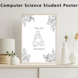 May include: A black and white line drawing poster with a floral design and the text "Keep Calm and Code On". The poster features a woman sitting with a laptop on her lap.