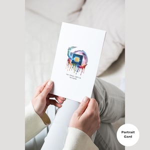 May include: A white card with a colorful abstract design of a computer chip with the text "Your energy lights up the system".