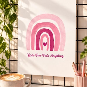 Puede incluir: Una lámina rectangular blanca con un arcoíris de estilo acuarela en tonos rosa y magenta con un pequeño corazón en el centro. Debajo del arcoíris, el texto dice Girls Can Code Anything en una fuente cursiva de color rosa oscuro.