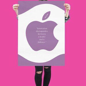 May include: A purple poster with a white Apple logo and a quote by Steve Jobs: "Innovation distinguishes between a leader and a follower."