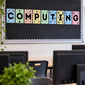 May include: A rectangular black bulletin board with a scalloped border features nine individual rectangular cards arranged in a row. Each card displays a single black letter spelling the word COMPUTING, accompanied by small colorful tech-themed icons.