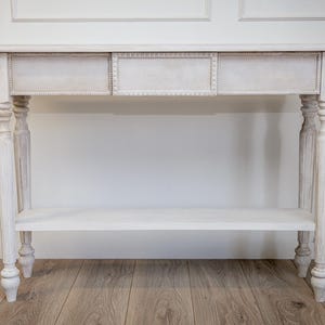 Rustica II console table off white with bottom shelf. Handmade elegant furniture in old money Italian style. Narrow table, slim console.