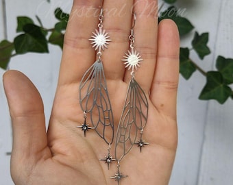 Pendientes colgantes de alas de hada con sol celestial y estrellas en tono plateado, joyería caprichosa de estilo cottagecore